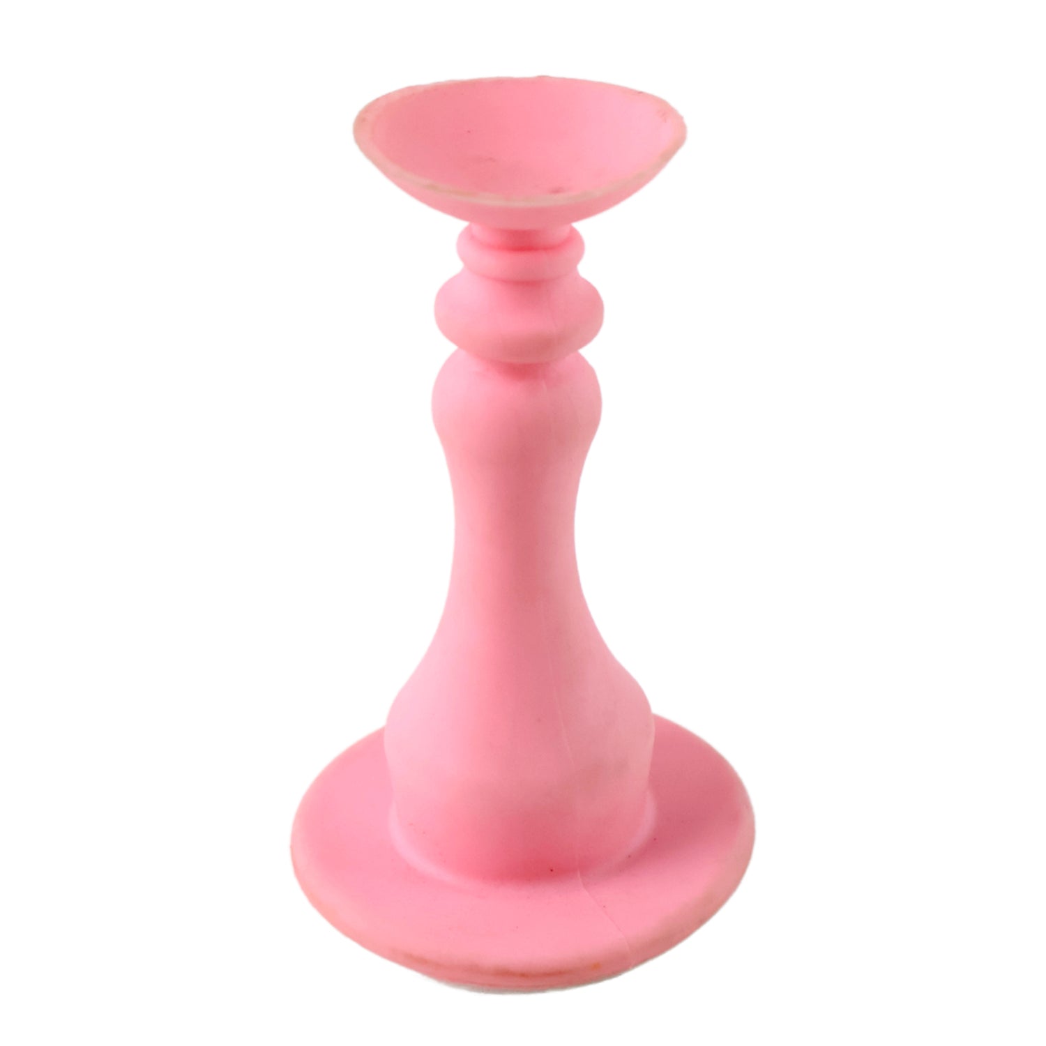 Hand holding pink washing machine door prop