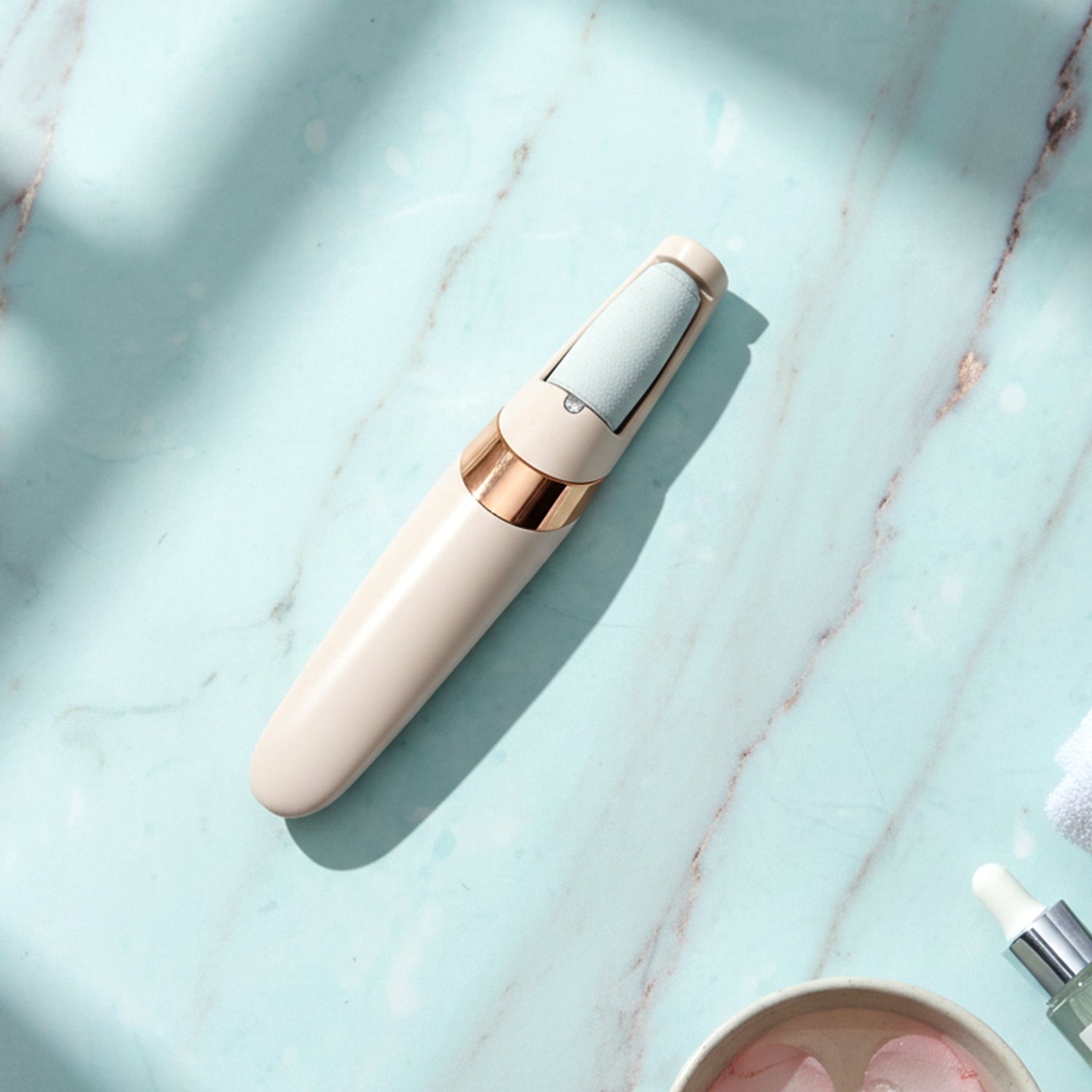 Flewless Pedi pedicure tool with roller heads displayed