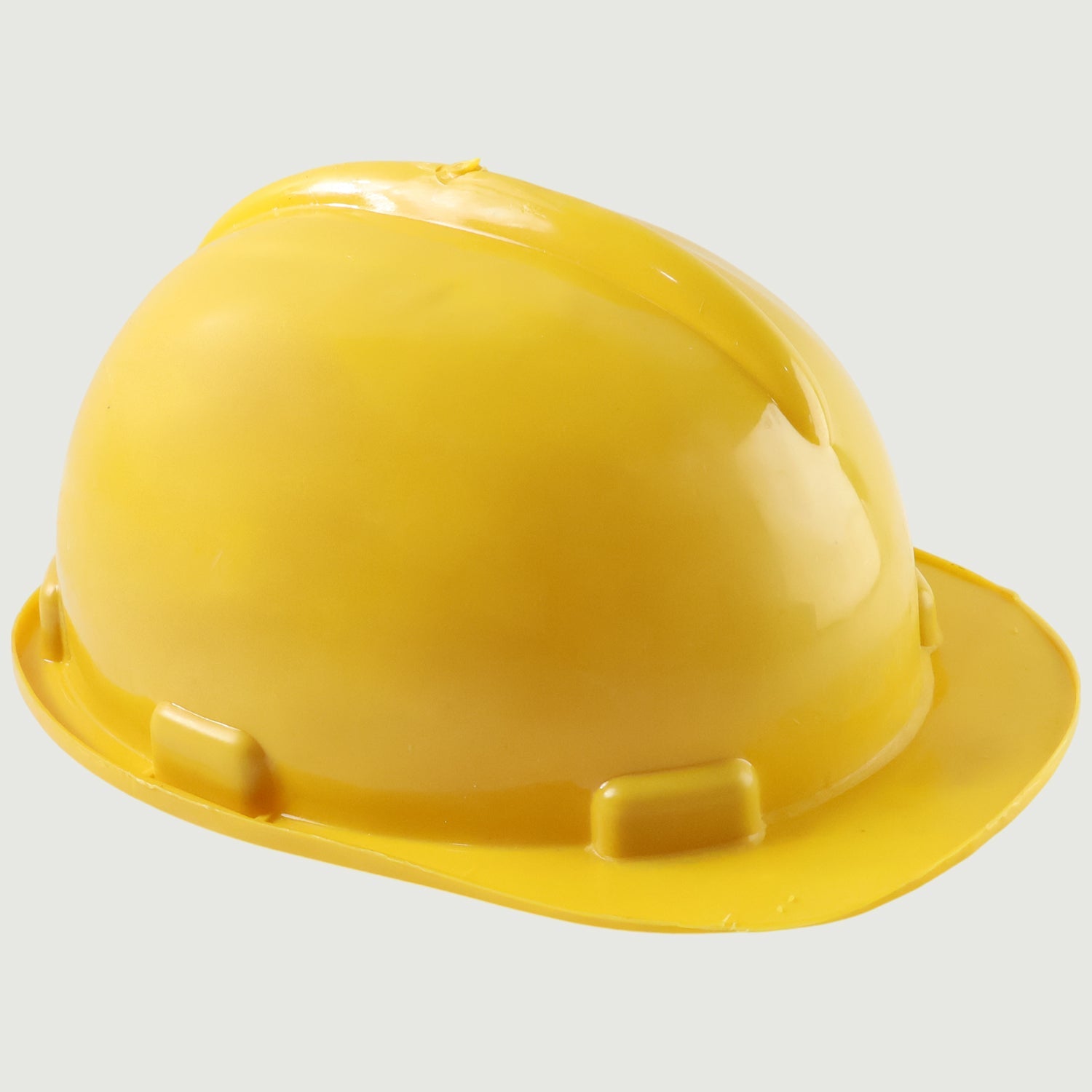 Close-up of yellow construction safety helmet showcasing impact-resistant material