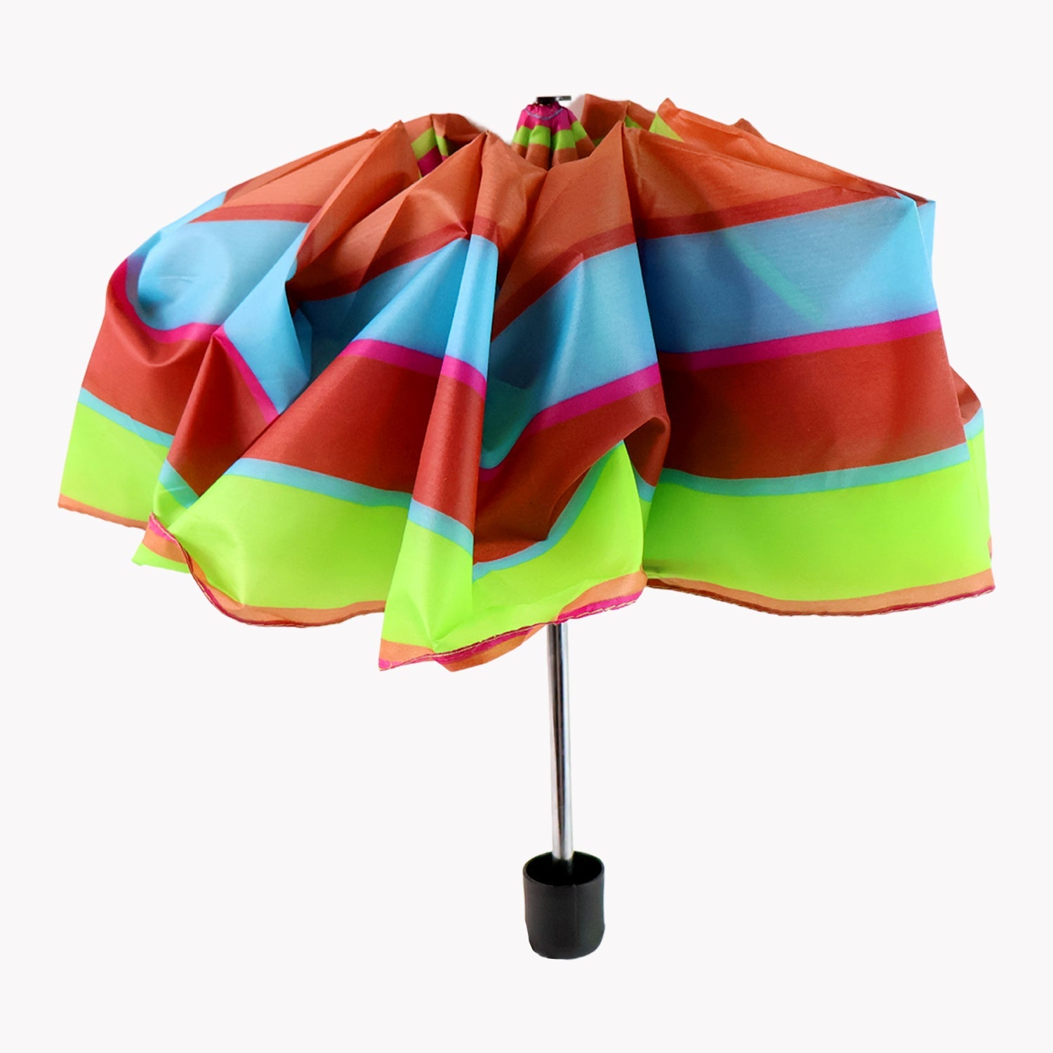 Folded umbrella next to a backpack for portability