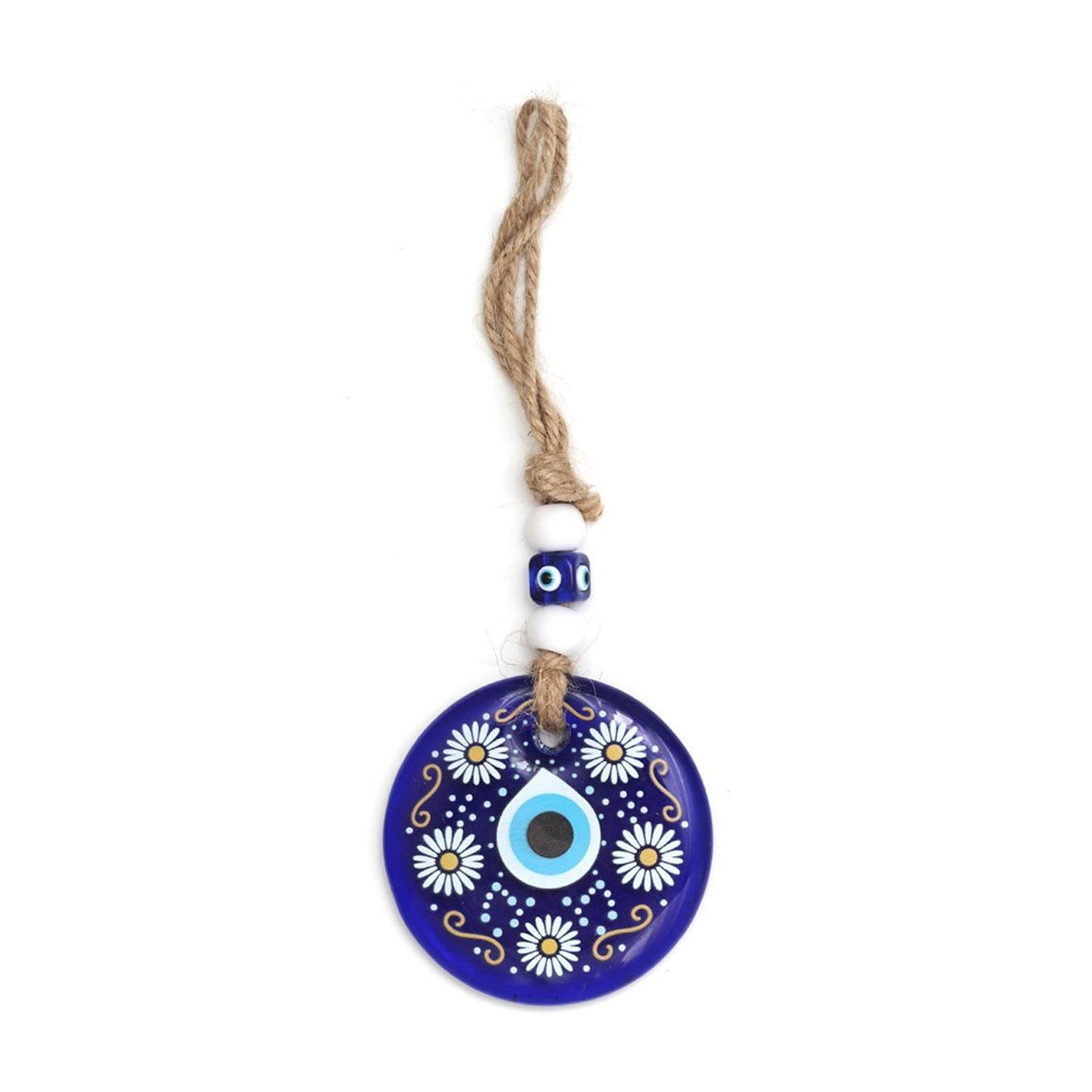 Detailed view of the evil eye charm's blue eye and decorative elements