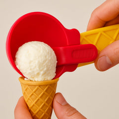 Plastic ice cream and watermelon scooper full view