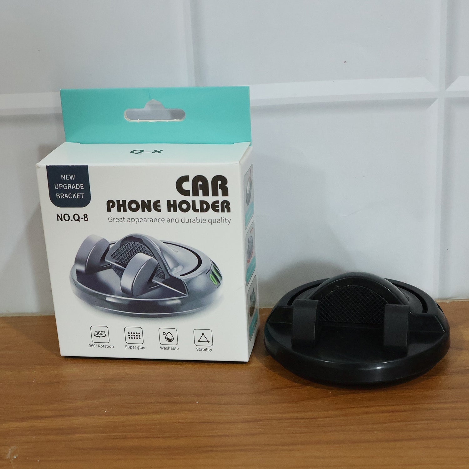 Side view of the dashboard phone holder highlighting its stable and secure grip.