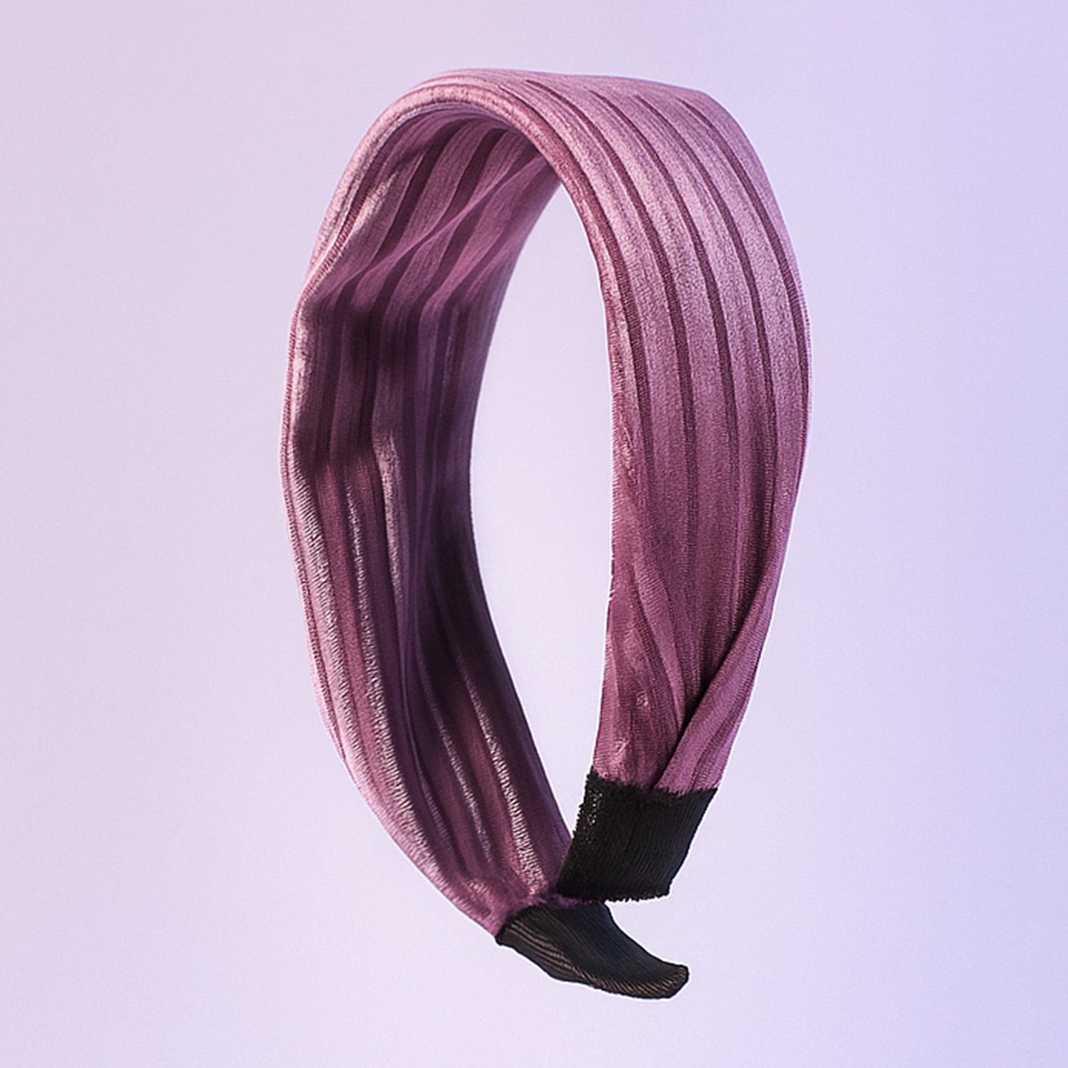 Women's ribbed knot hairband in dark color on a white background