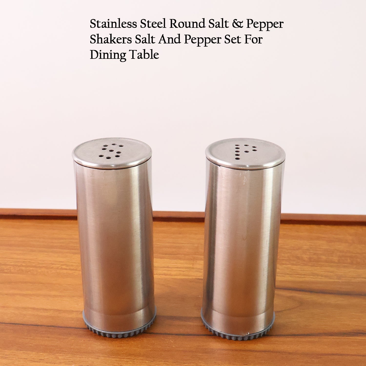 Sleek stainless steel salt and pepper dispensers