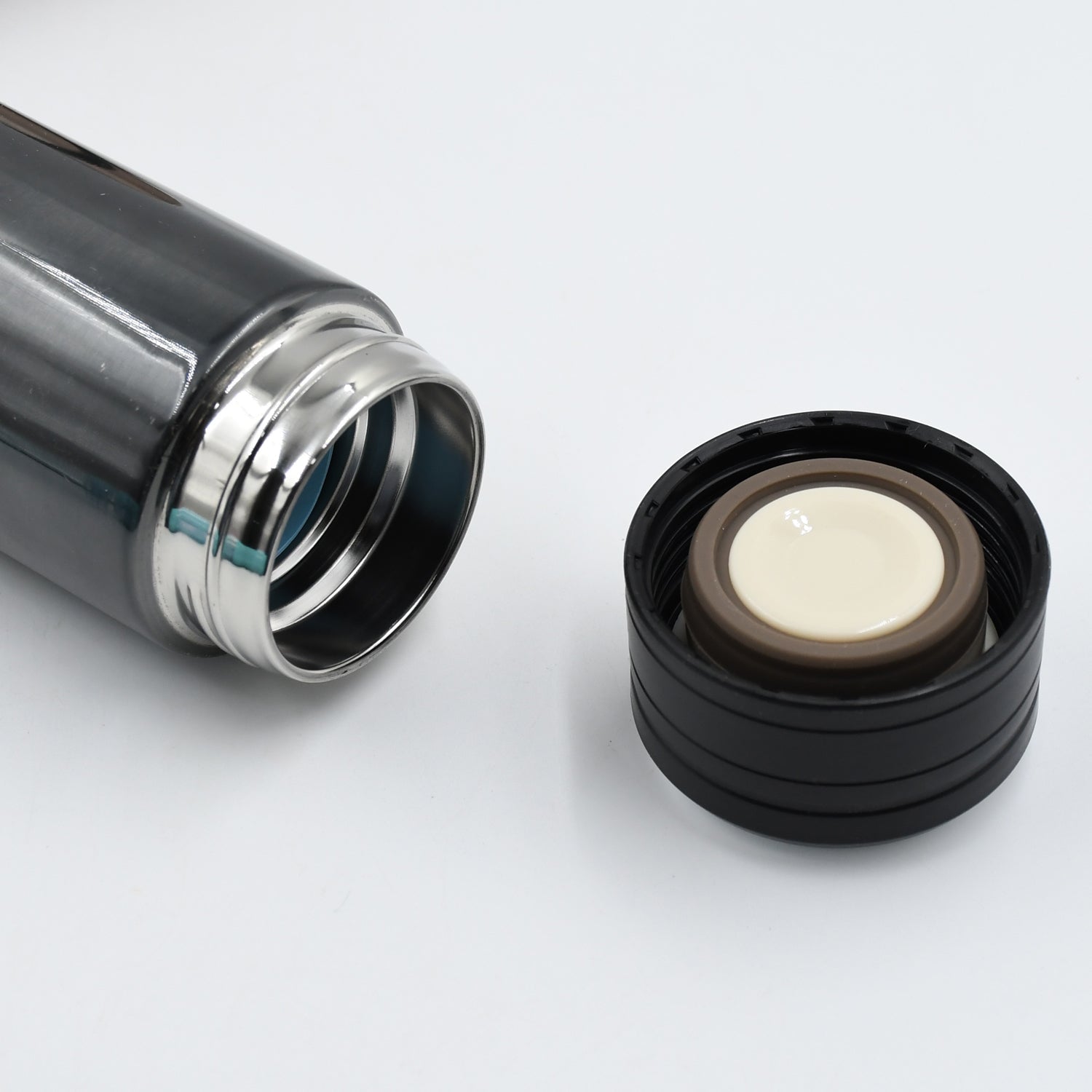 Portable stainless steel thermos