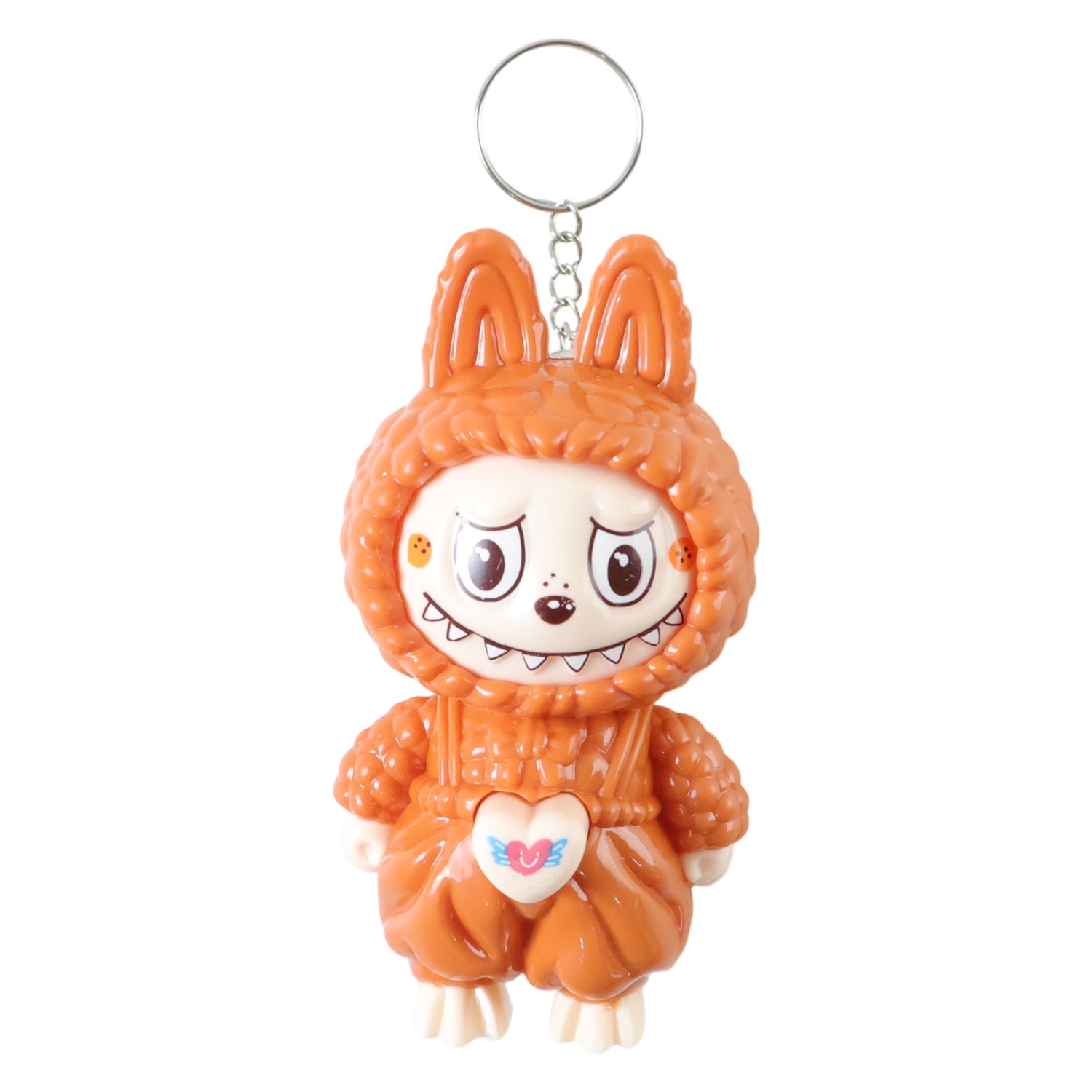 Side view of cartoon character keychain toy attached to keys