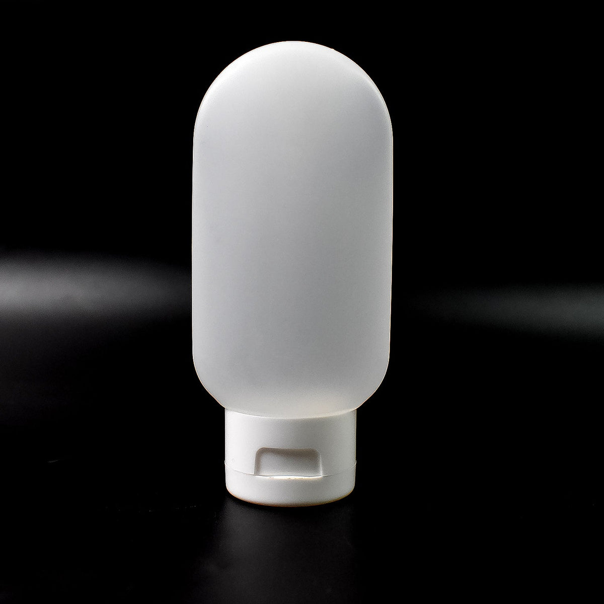 Reusable 60ml plastic travel bottle in mixed colors