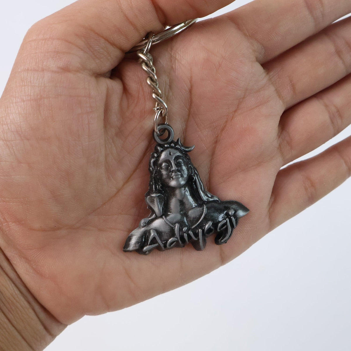 Close-up of Shiva Face Metal Keychain Detailing