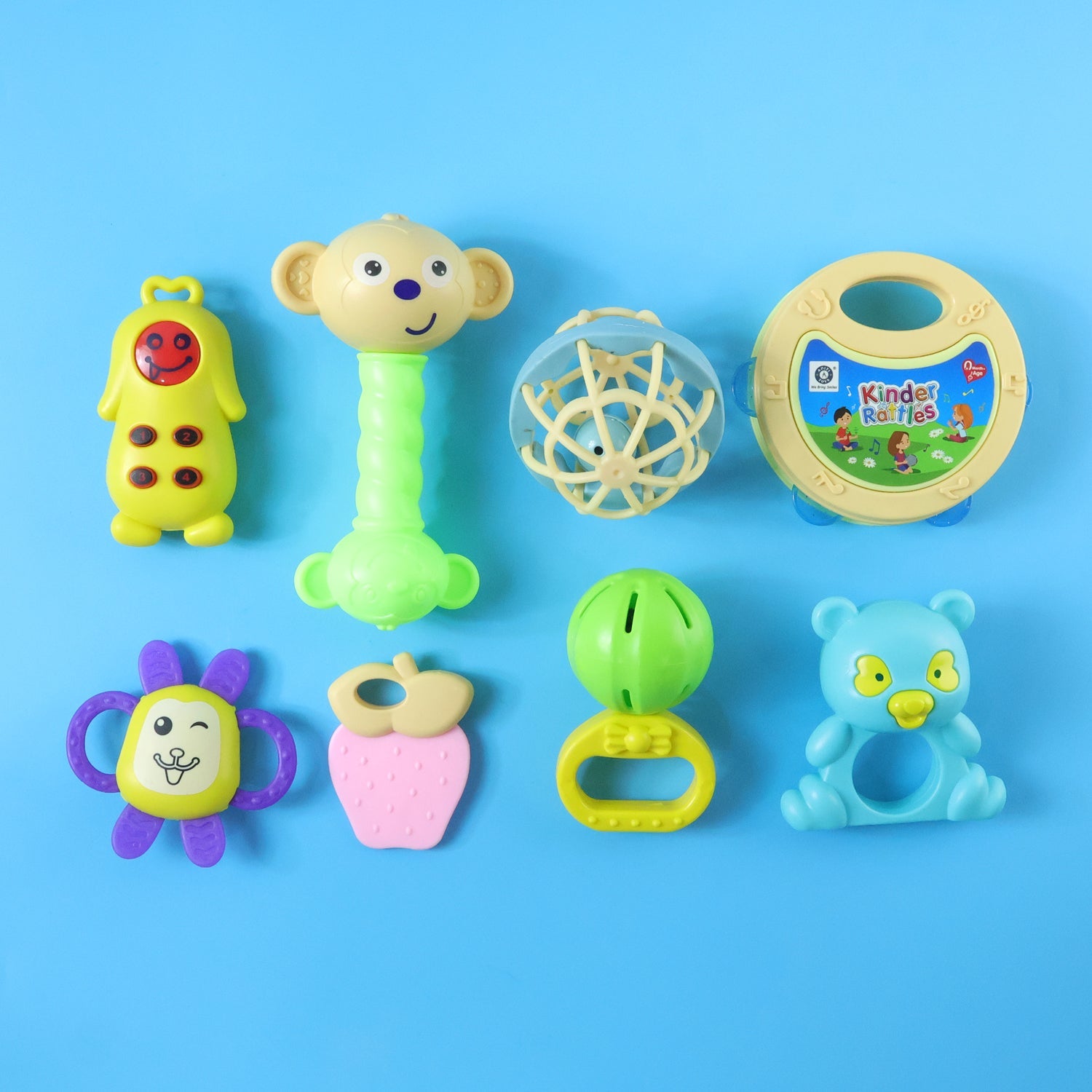 Various AT37 baby rattles in different shapes & colors