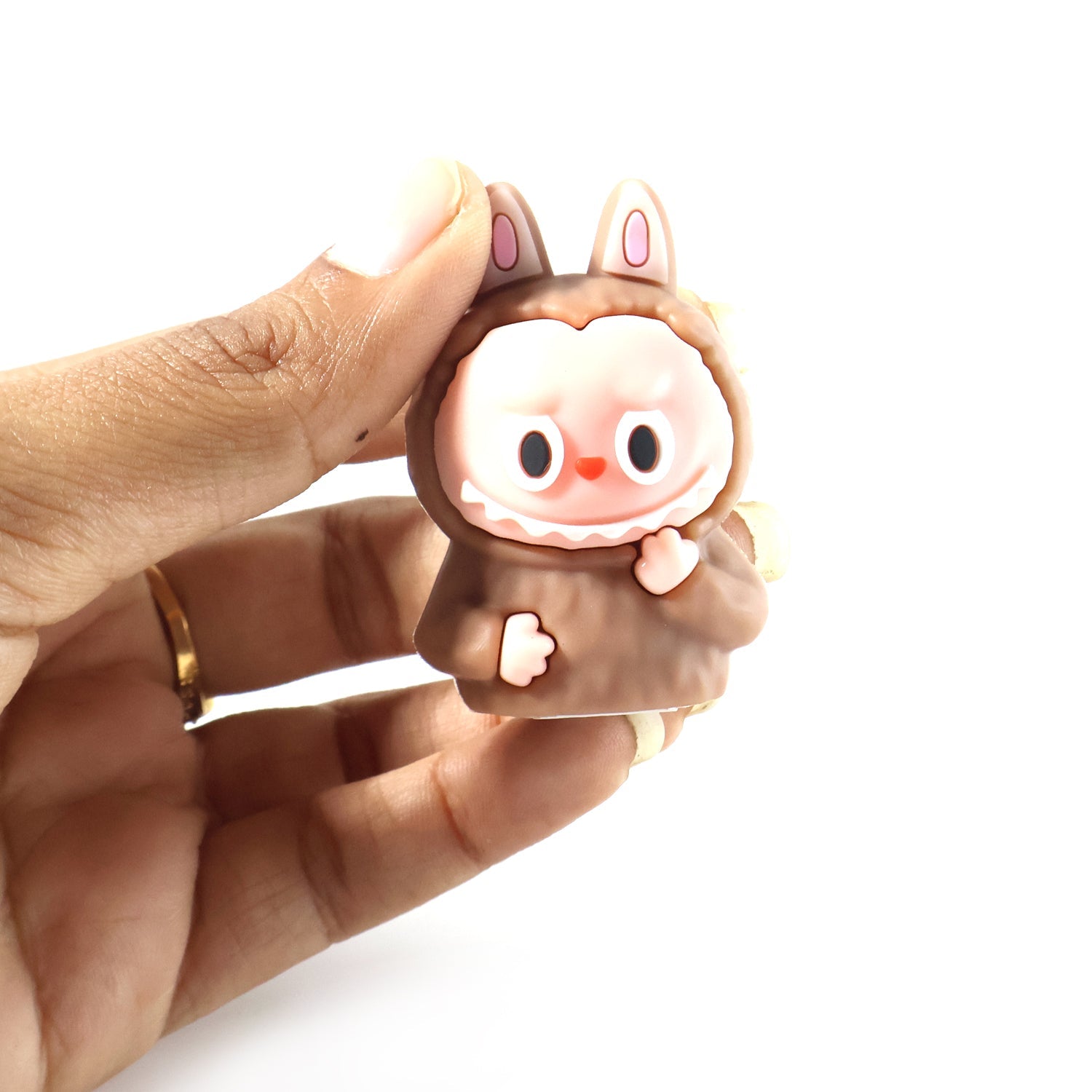 Cartoon dinosaur themed eraser with integrated sharpener