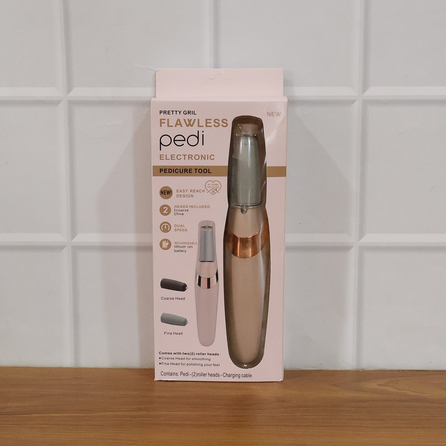 Flewless Pedi pedicure tool close-up with roller heads