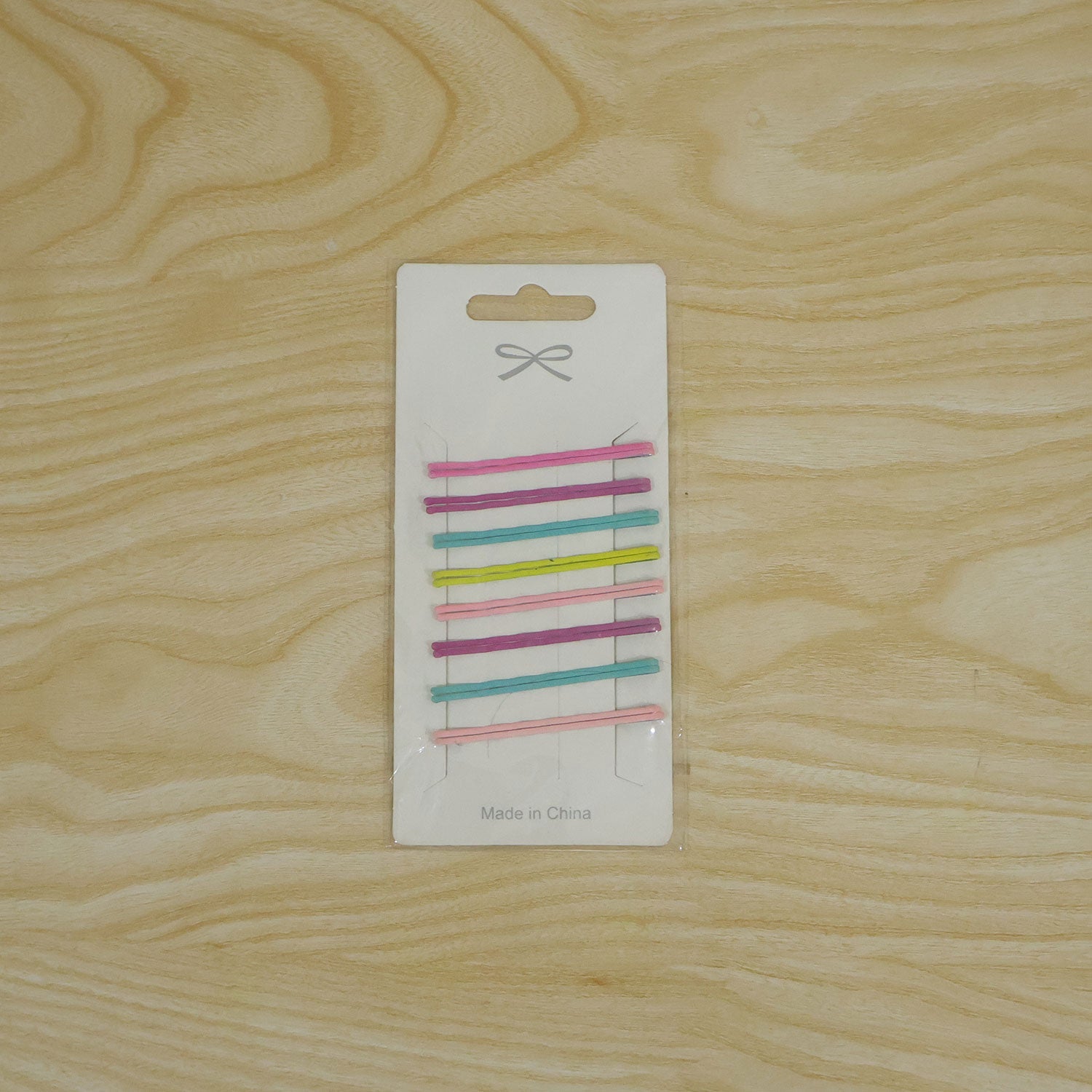 Colourful hair pins white bg