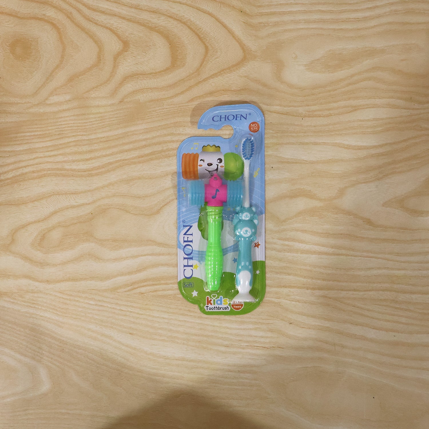 Multiple kids' toothbrush and hammer toy sets arranged