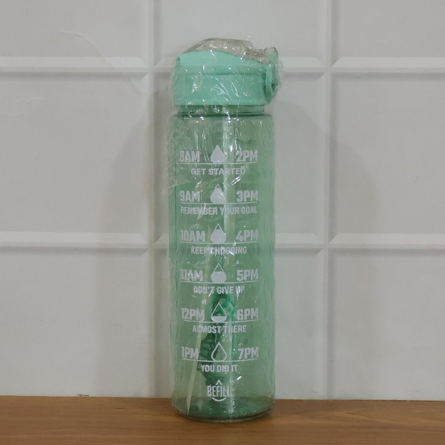 Water bottle shown with gym and outdoor gear