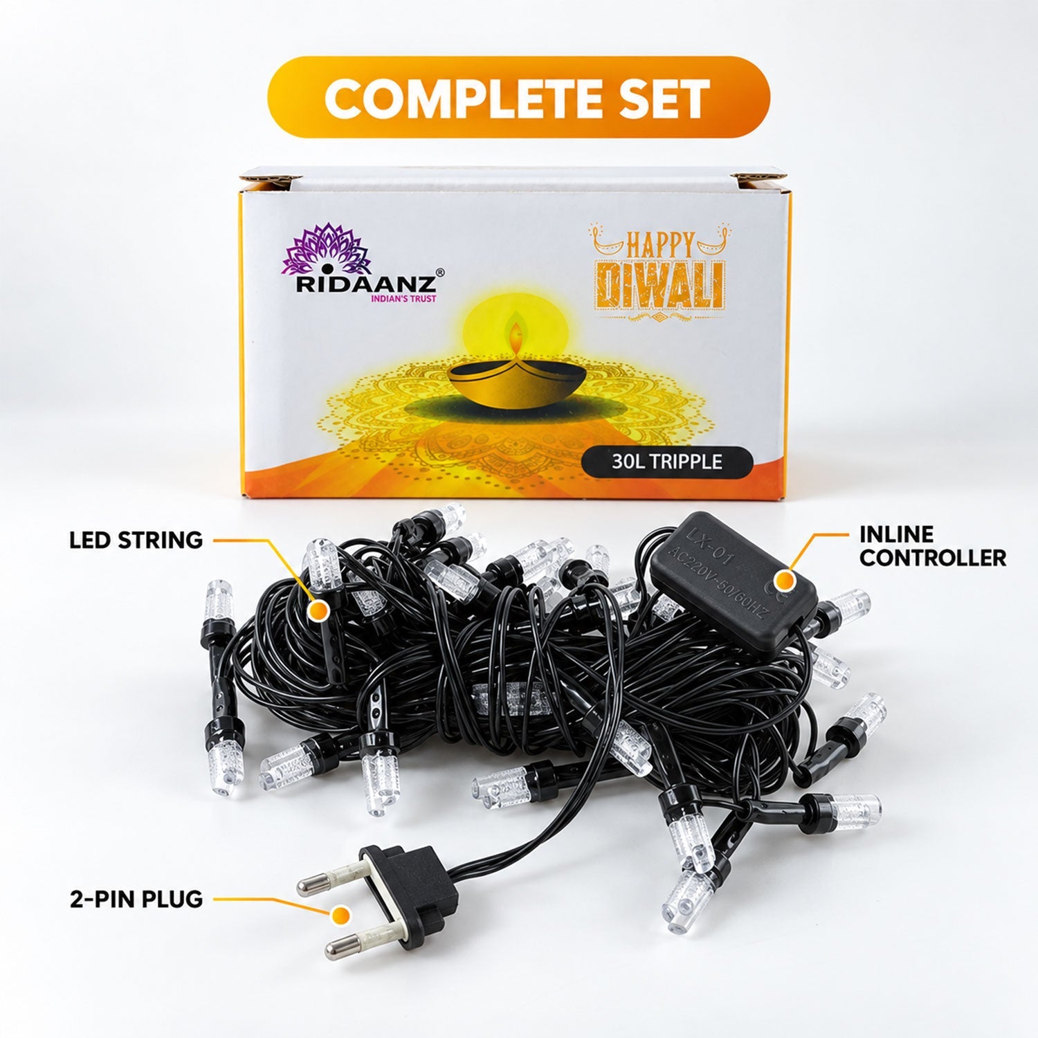 A coiled string of clear LED lights with a black wire and plug, next to a white box with