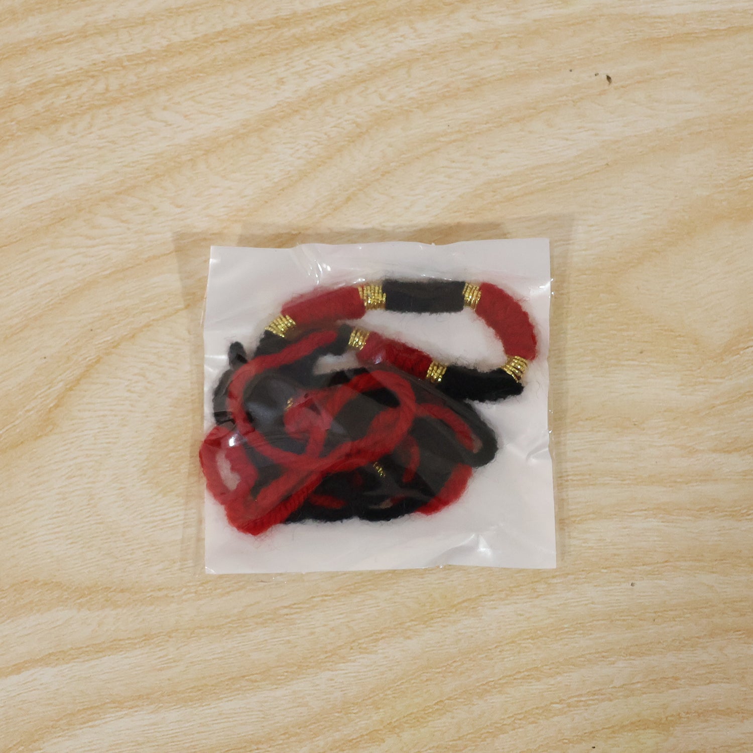 Red Black Thread Rakhi Packaging