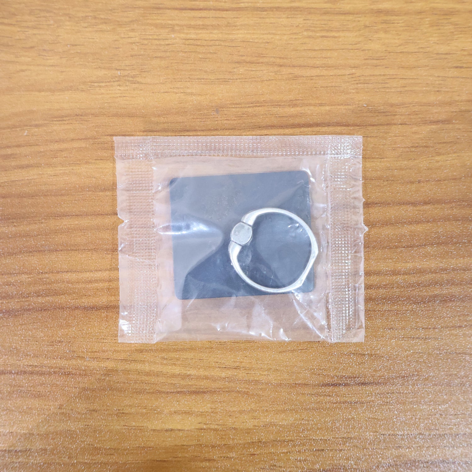 Mobile Phone Finger Ring Stand Holder used as a car mount holder