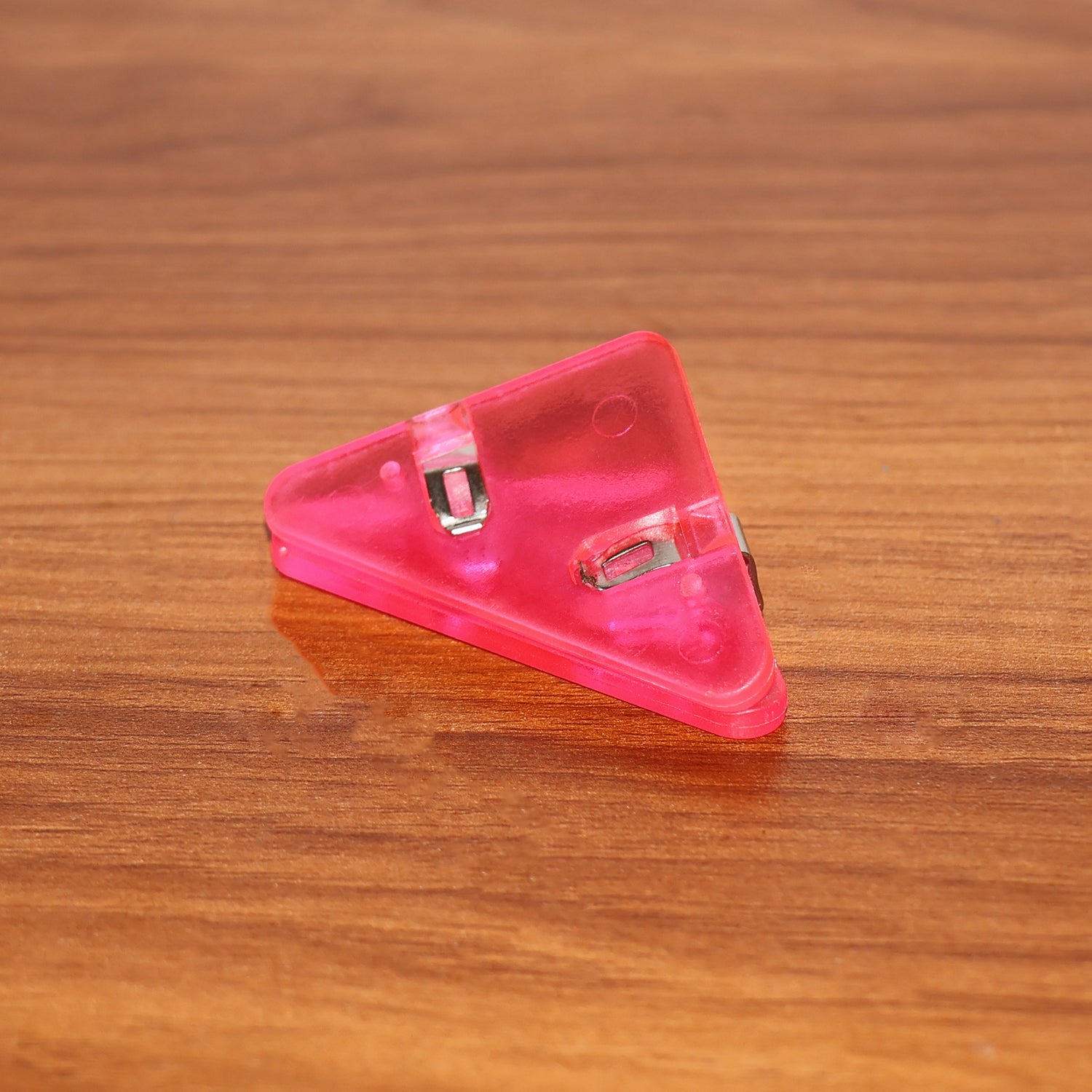 Triangle paper clips used on book pages