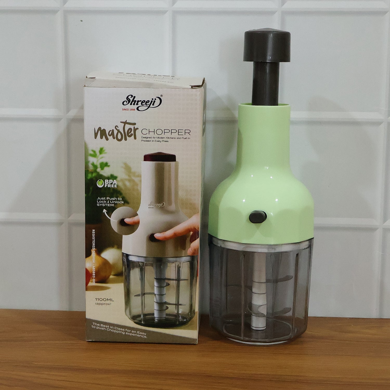 Vegetable chopping tool with storage bowl