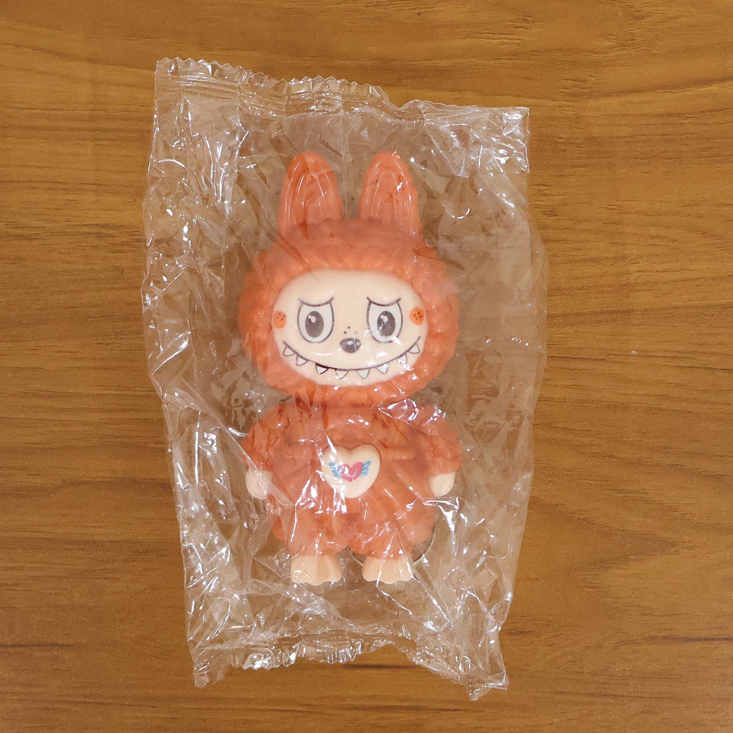 Face changing keychain toy demonstrating expression switch feature