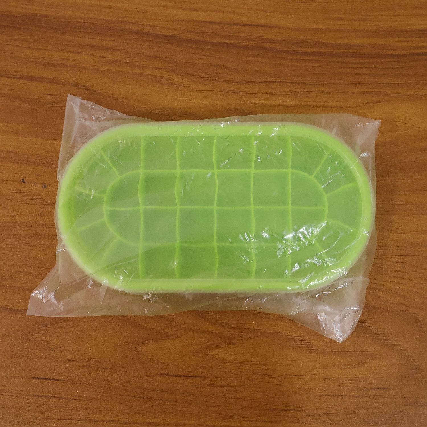 Oval ice mold tray for cocktails and cold drinks