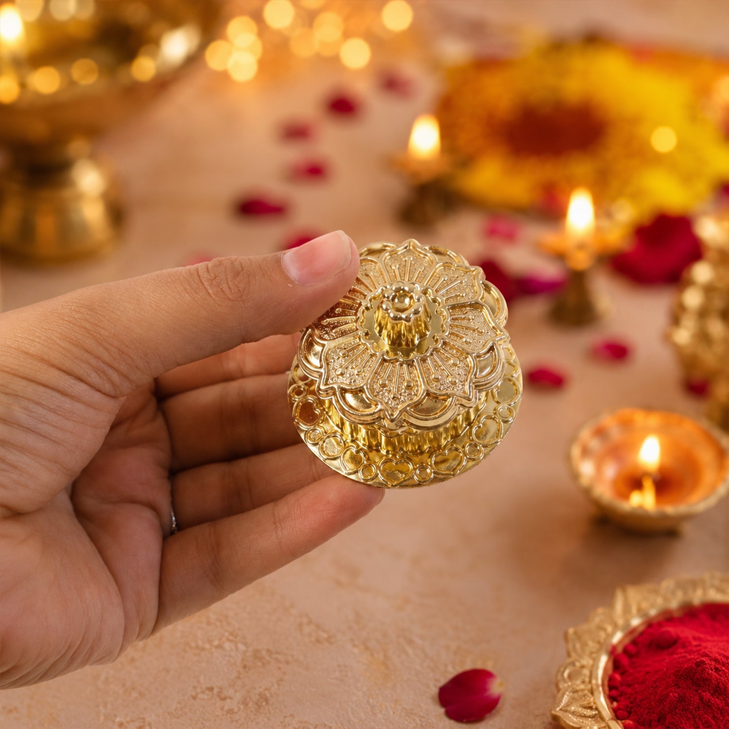 Traditional golden pooja storage container for sindoor and kumkum