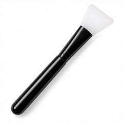 A black and white silicone face mask brush with a wide, flexible head and long handle is angled on a clean white background.