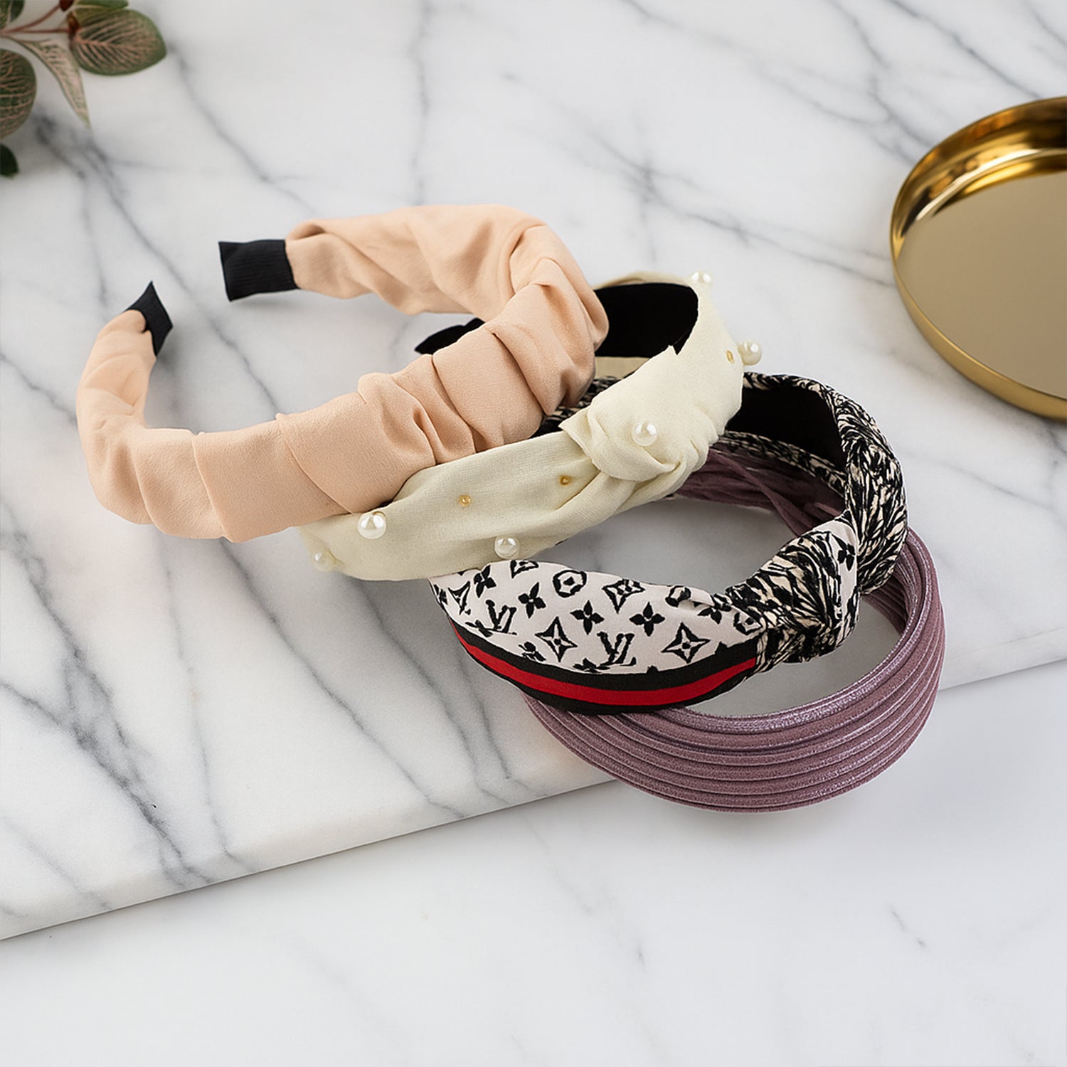 Multiple styled looks featuring the ribbed knot hairband