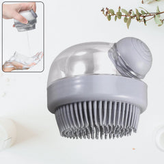 Top view of scalp massager brush showing ergonomic handle