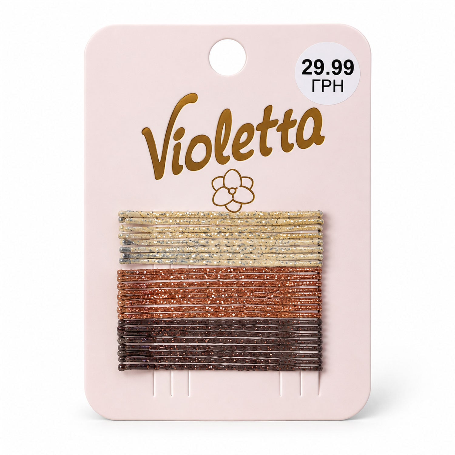A full view of the pink card packaging holding 24 glitter bobby pins in three color sections.