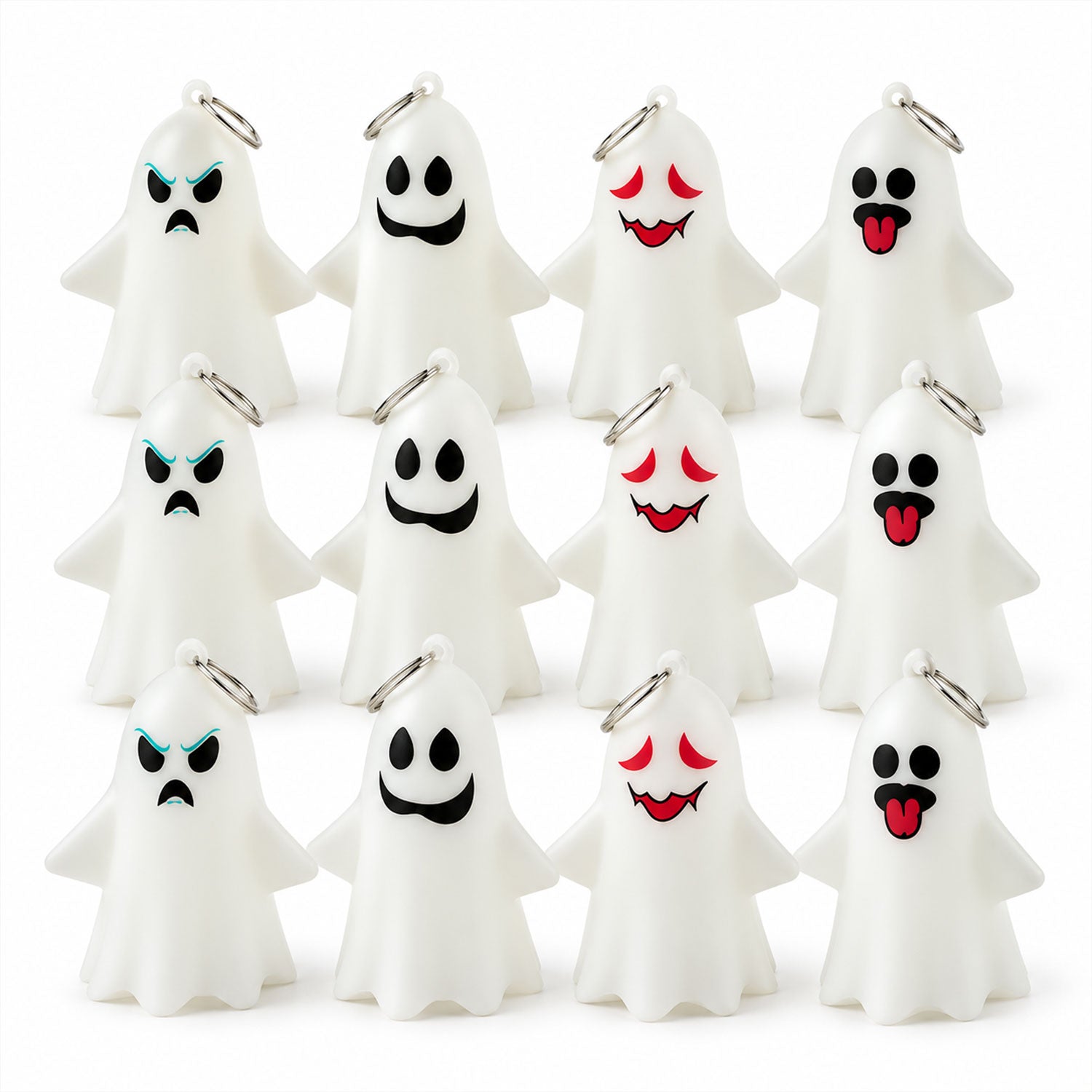 Twelve unlit white ghost figures with four different expressive faces and silver hanging rings are arranged in rows.