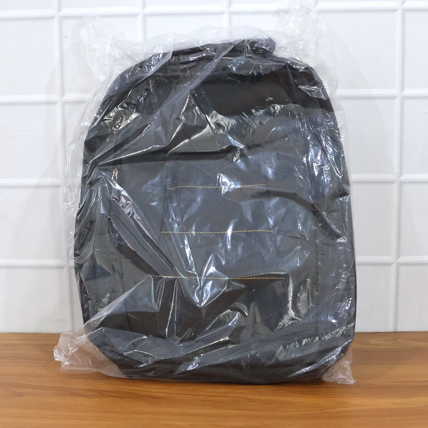 Laptop backpack showcasing multiple compartments and zipper details