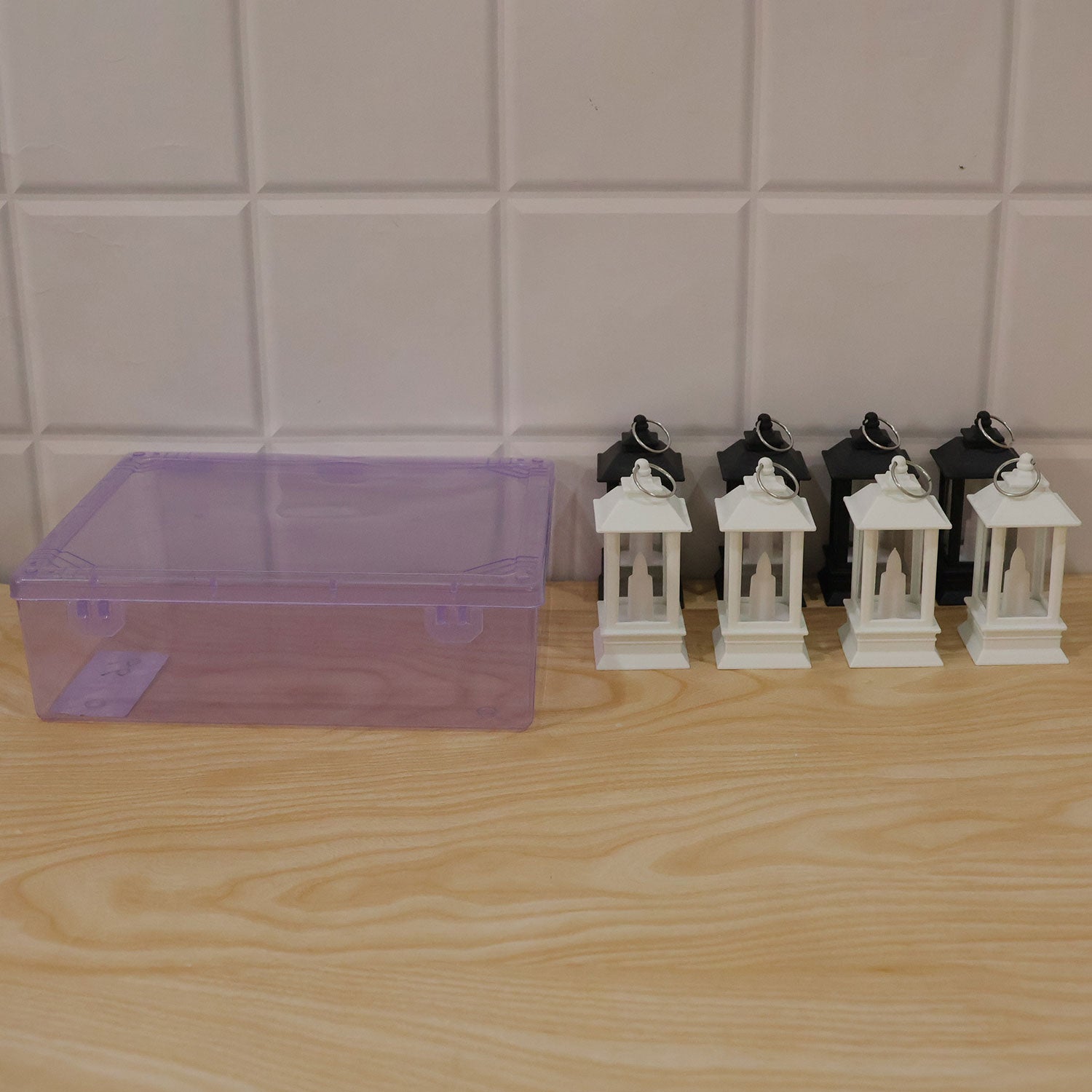 Flameless LED mini lantern candles used as decorative accents in a modern home interior