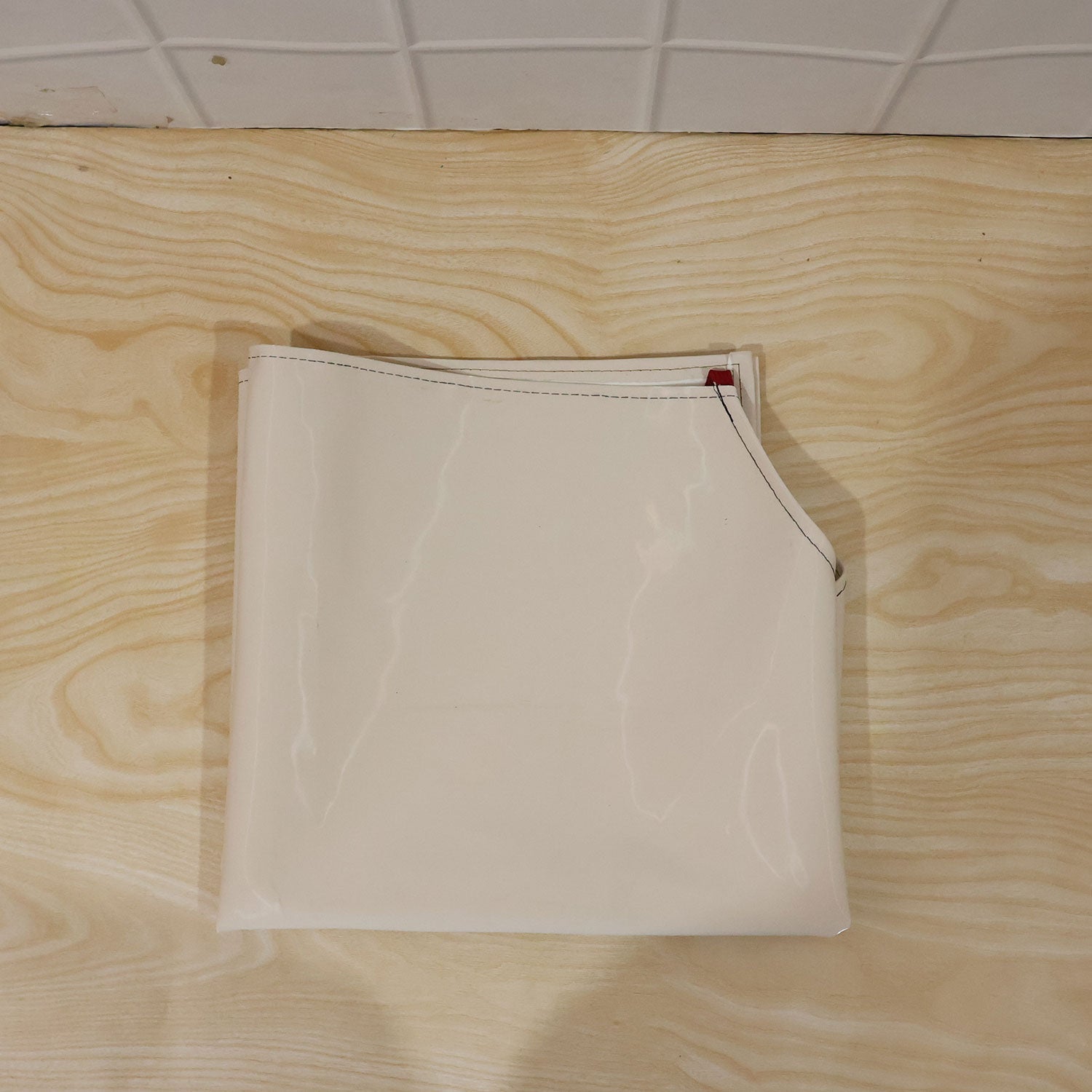 Person wearing waterproof apron while cooking