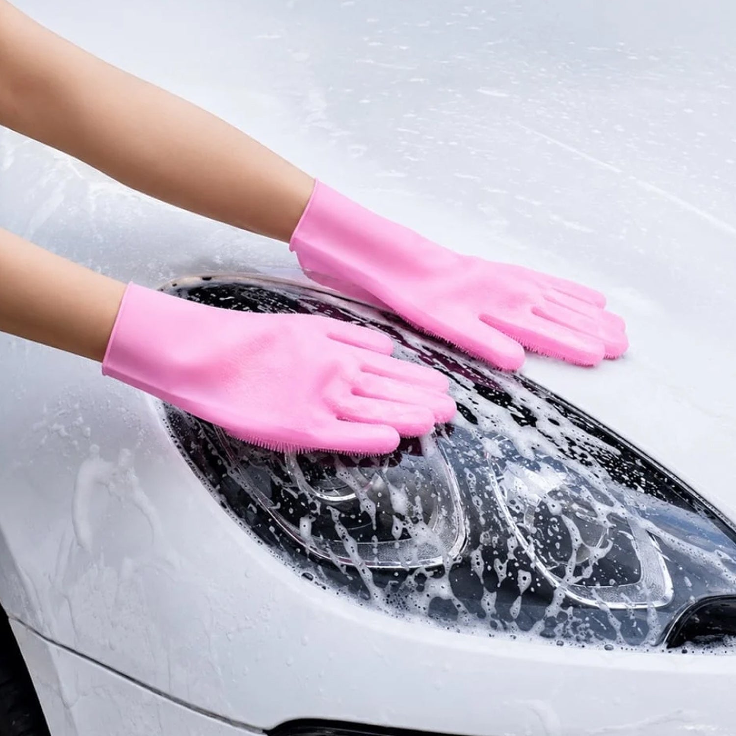Pair of scrubber cleaning gloves laid flat