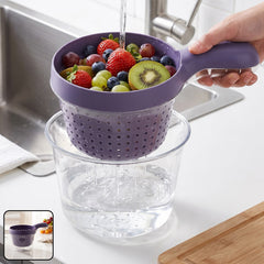 Plastic fruit washing drain basket in use