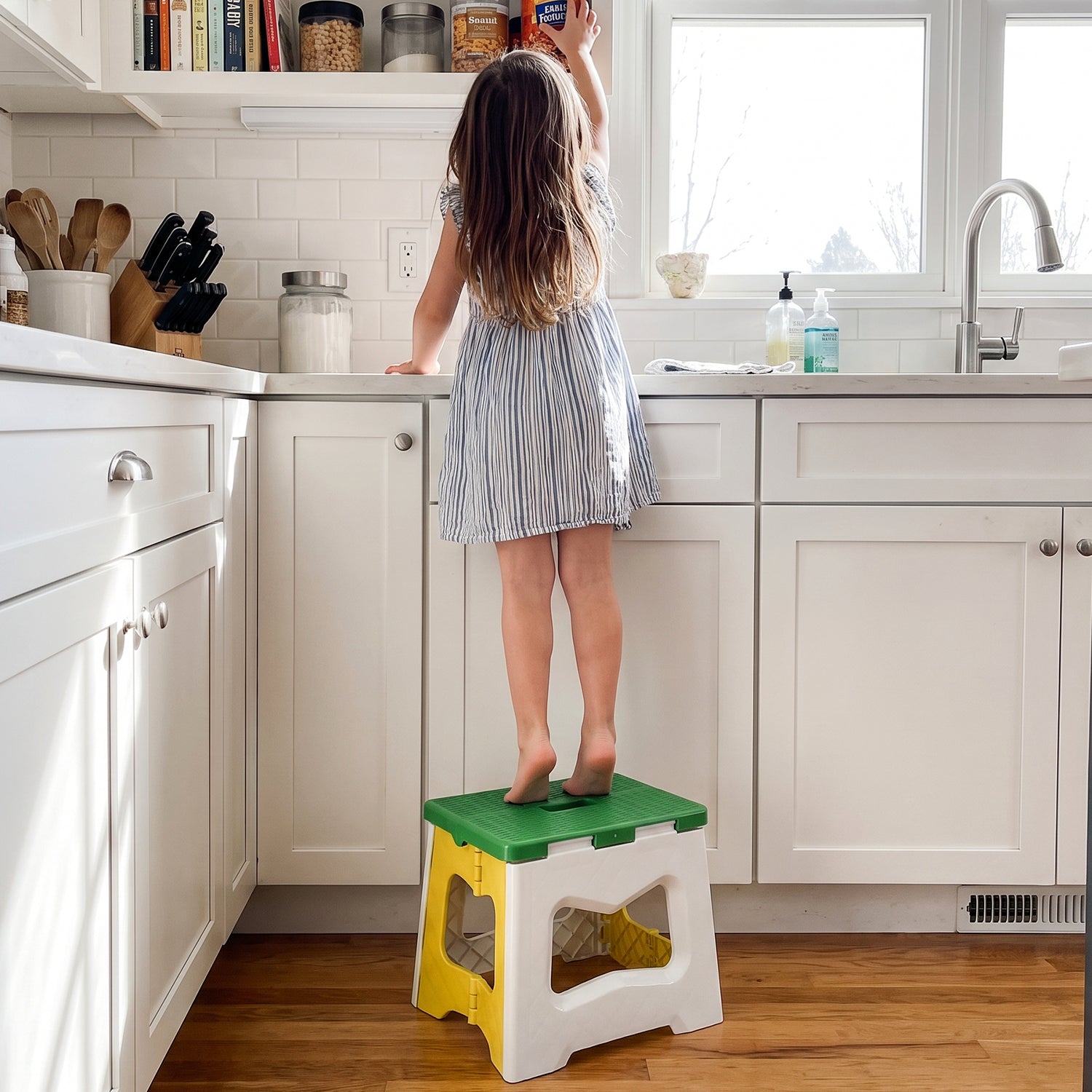 Portable folding stool for kitchen use