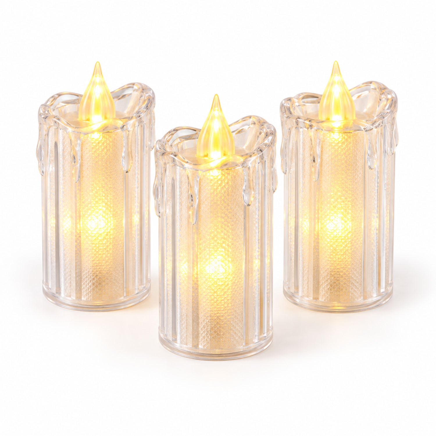 Three clear plastic LED candles with textured sides and a faux flame tip, glowing with a warm yellow light on a white