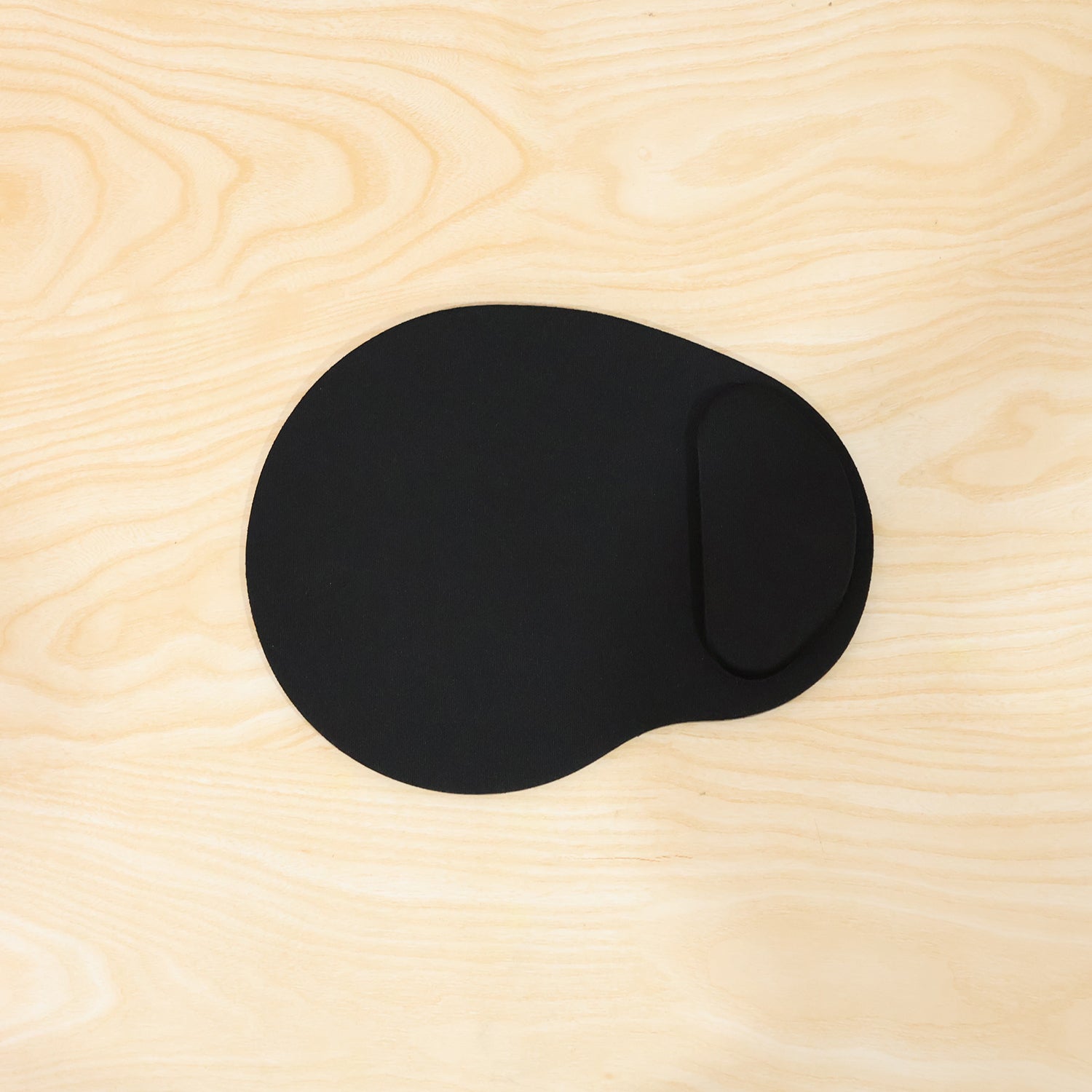 Person using ergonomic mouse pad for daily computer work