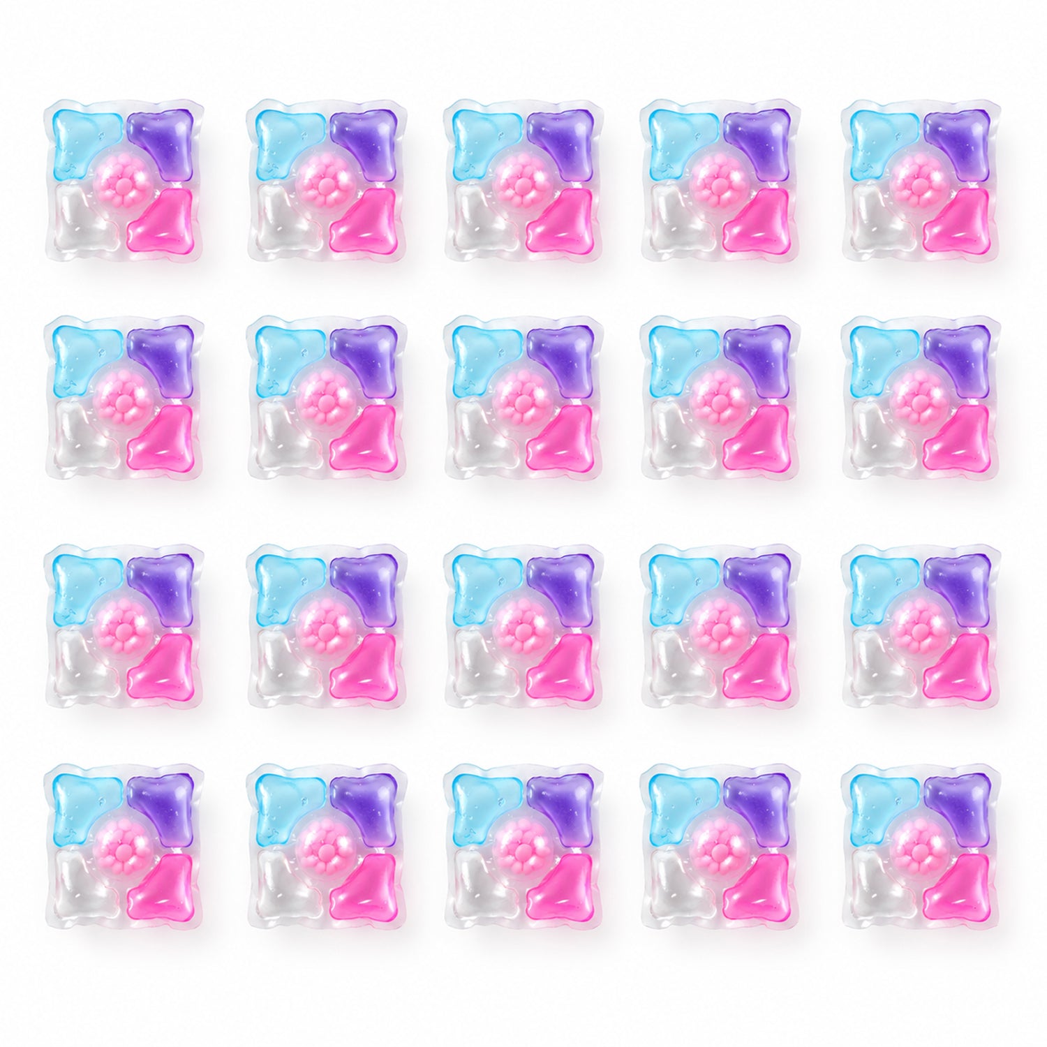 Twenty individual multi-colored laundry detergent pods are arranged in four rows of five on a plain white surface.