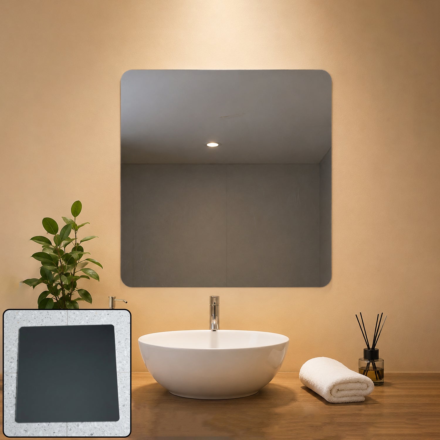 A square mirror with rounded corners hangs above a white sink in a modern bathroom setting