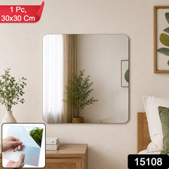 A square mirror with rounded corners hangs above a wooden nightstand in a bedroom, with a small plant.