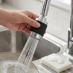 Faucet Sprayer in Use on Kitchen Sink