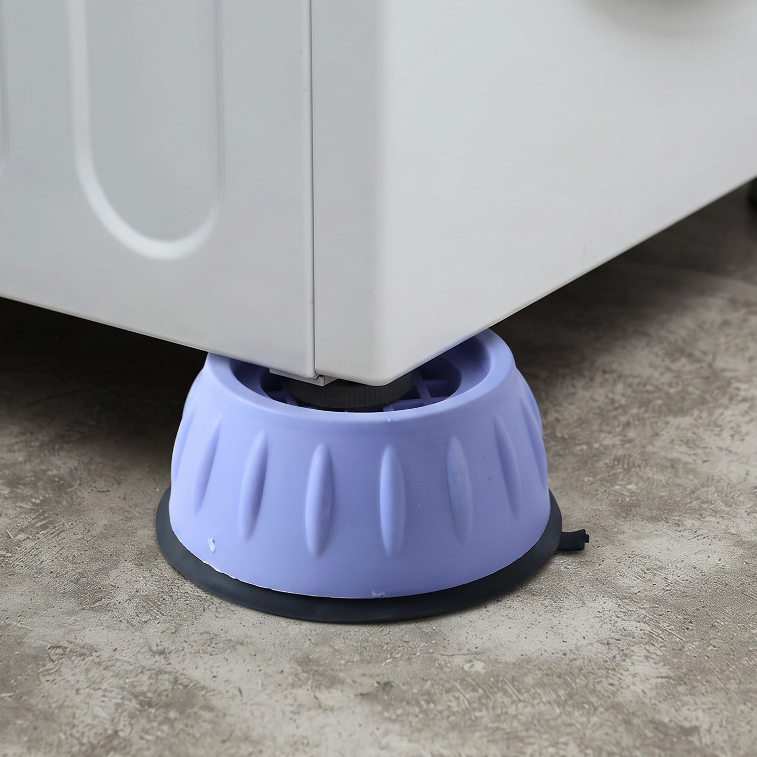 Pads fitted under a washing machine