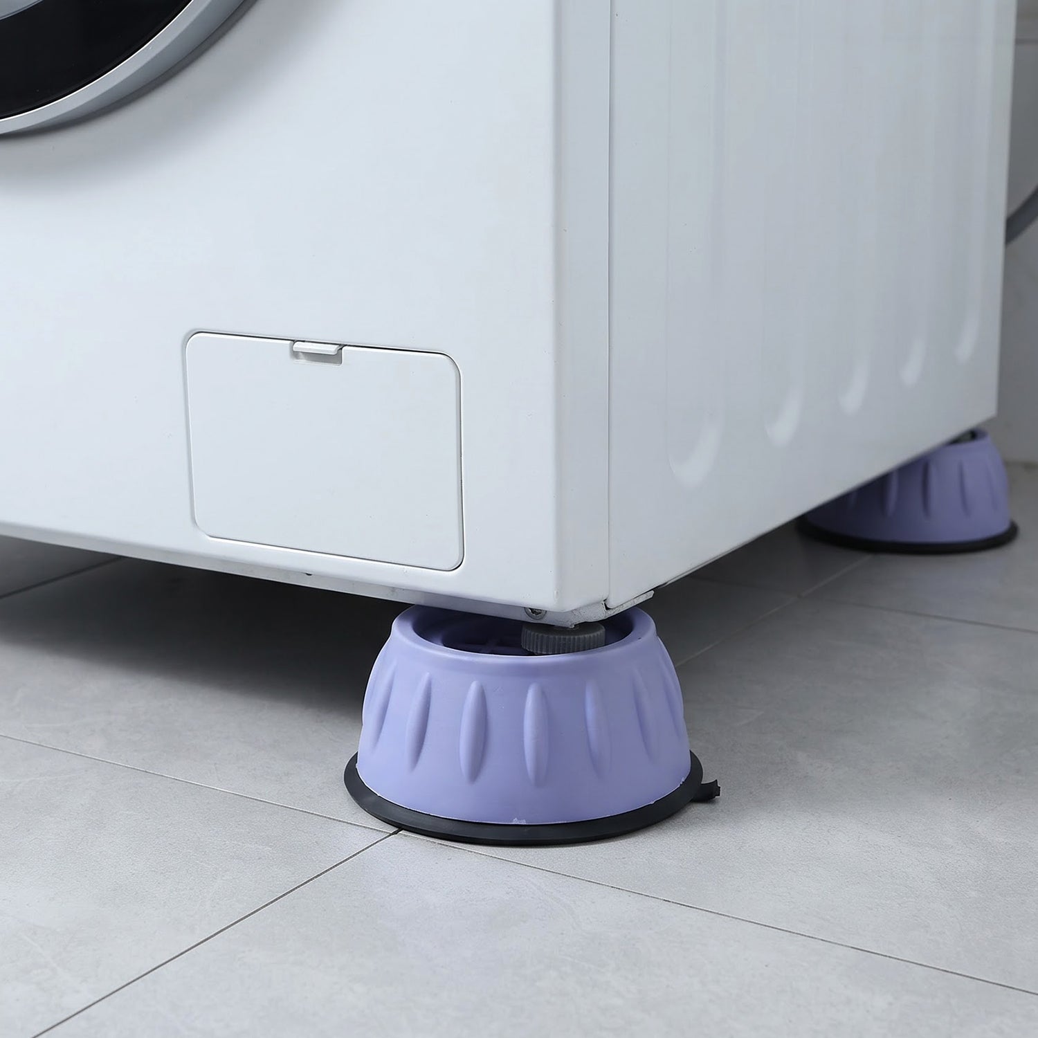 Pads reducing shaking and noise during a spin cycle