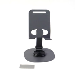 Close-up of sturdy metallic round base of mobile stand