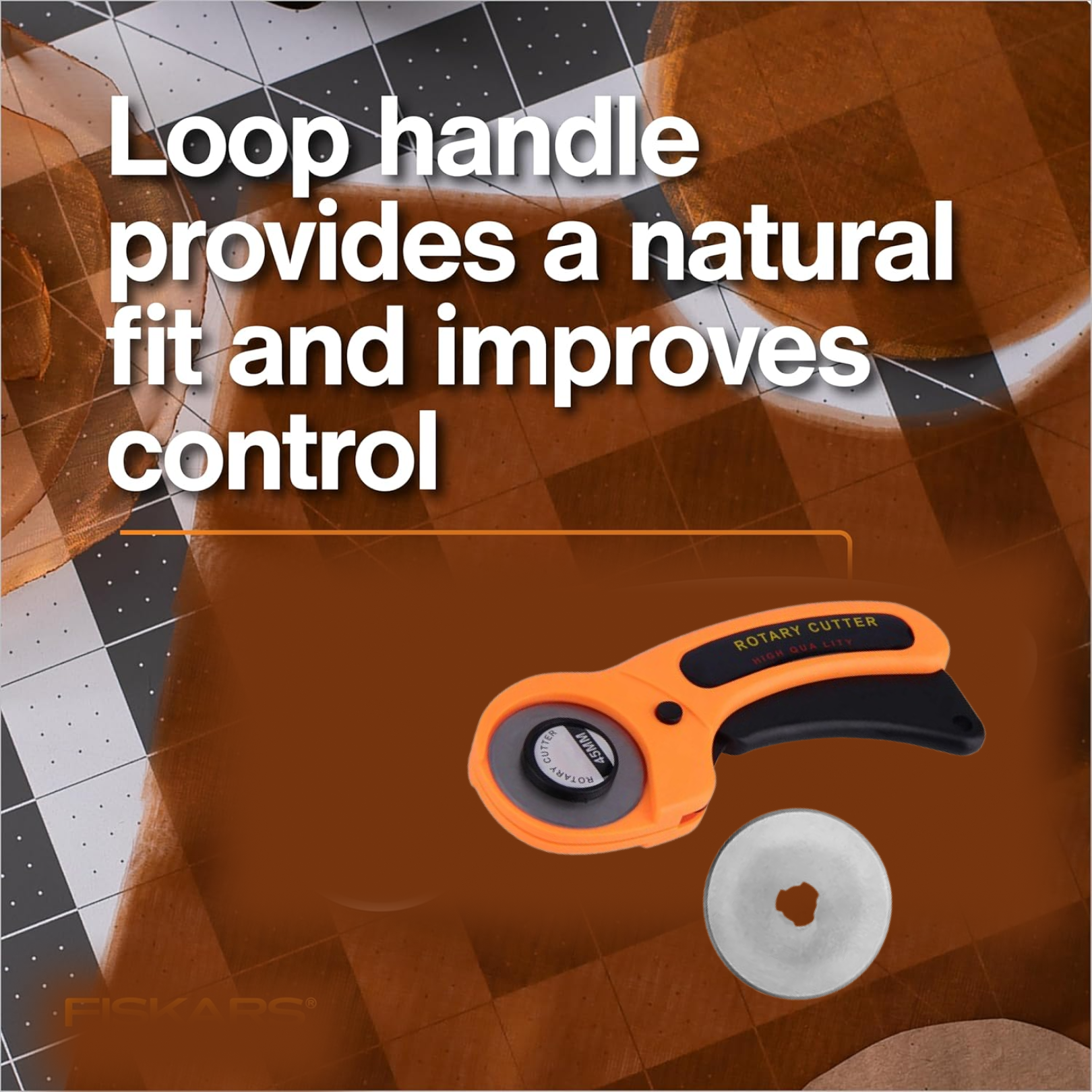Top view of rotary cutter showcasing ergonomic handle and blade
