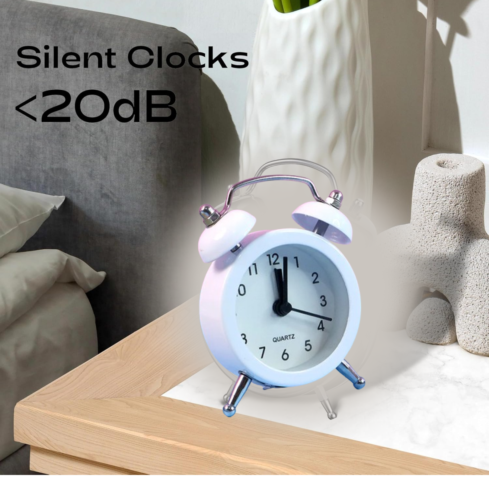 Twin-bell alarm clock showing side controls