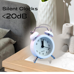 Twin-bell alarm clock showing side controls